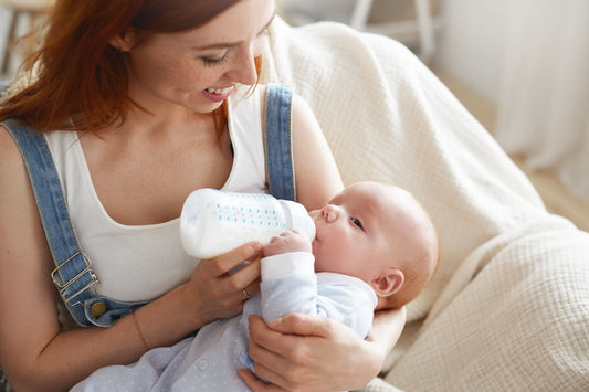 can breast milk be reheated twice